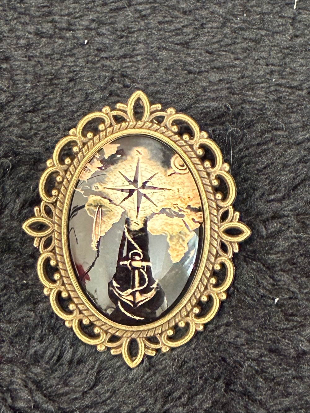 Gold-Tone Compass Rose Globe Cameo Brooch - Black and Gold